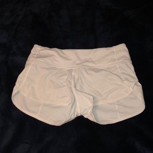 white lululemon shorts